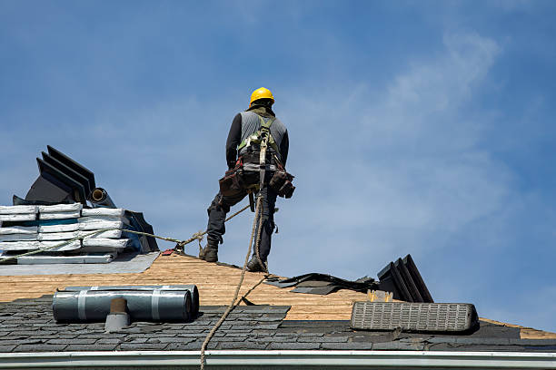 Professional Roof Repair technician working in Brainard, NY